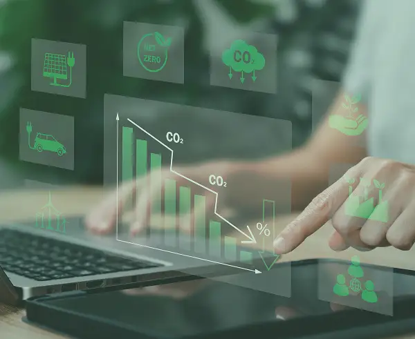 A photo of a person on a laptop with data graphics and sustainability icons.